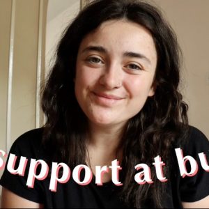 Kage smiling at the camera and the words support at BU