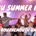 People dancing at a concert with with words SUBU Summer Ball Bournemouth Uni