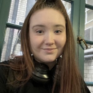 Student smiling at camera